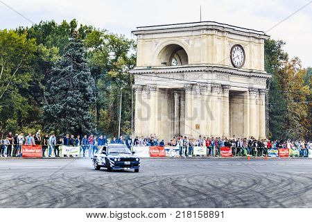 23 september 2017 drift bmv 3 a crowd of unidentified people watching with interest the maneuvers of an experienced driverChisinauMoldova