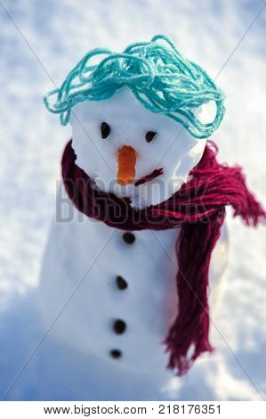 Little small Snowman in snow with copy space