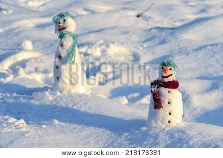 Little small Snowman in snow with copy space