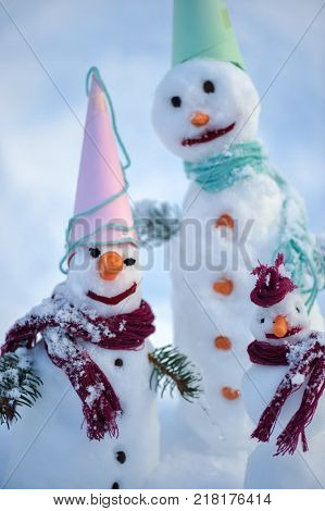 Little small Snowman in snow with copy space