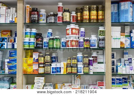 SIDE, TURKEY - 4 OCTOBER , 2017: Pharmacy cabinets with medicines and drugs tablets and food additives