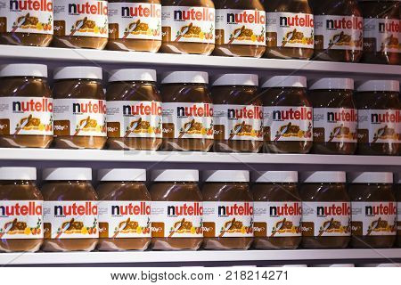 TEL AVIV, ISRAEL - 26 NOVEMBER 2017: Background with cans of chocolate nutty pasta Nutella attractions of the city Market Sarona .