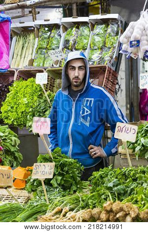 TEL AVIV , ISRAEL - 21 NOVEMBER 2017: Sellers on the old grocery street Nahalat-Benjamin