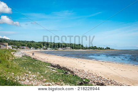 Coast of Golspie, Sutherland, Highland, Scotland. A summer view along the North Sea coastline and award winning beaches of Golspie a small town in the north east of Scotland in the Scottish Highlands.