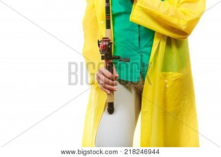 Spinning sport equipment concept. Person holding fishing rod with float and waggler with line.