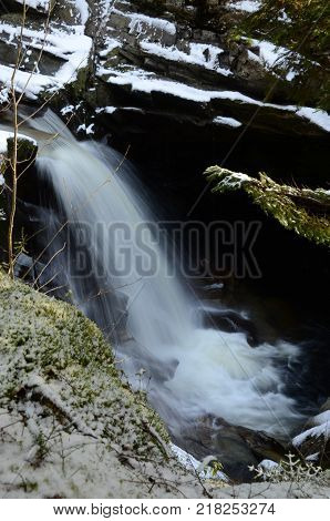 A view of a waterfall at the falls of Bruar