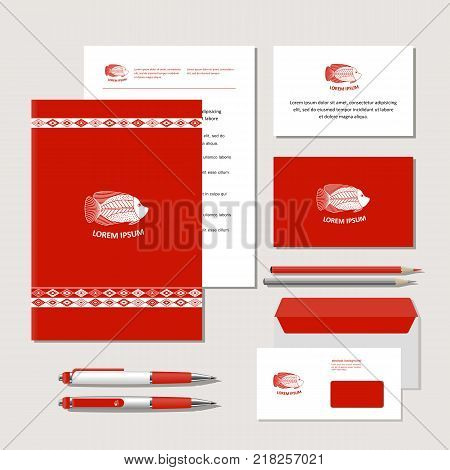 The bright corporate identity with fish and ornaments in ethnic style. Samples of business cards a flash card a pen an envelope. Vector.