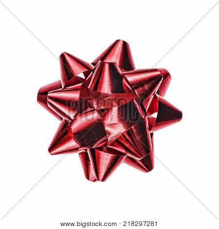 Red bow isolated on white background. A holiday symbol, an element of decor.close up