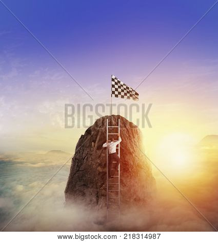 Businessman climb a mountain to get the flag. Achievement business goal and difficult career concept