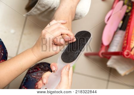 pedekyur in the beauty salon . Photos in the studio