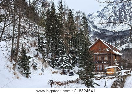 HREBIENOK, SLOVAKIA - JANUARY 07, 2015: Wooden hotel called Bilikova chata. Is a historical high mountain cottage in the Tatra National park. It lies on the southeastern foot of the Slavkovsky peak.