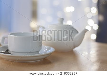 the image white Cup on table in cafe