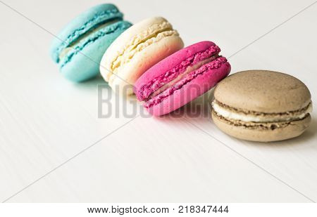 French Colorful Macarons on a White Background