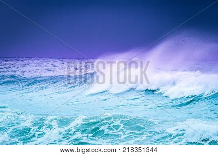 Sea water background. Beautiful breaking waves in the sea.