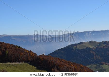 Italian autumn nature between mountain and mist