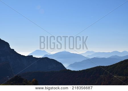 Italian autumn nature between mountain and mist