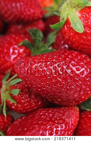 Strawberry background. Strawberries as pattern texture. Red sweet fresh strawberries as texture. Strawberry pattern as background. Strawberry.