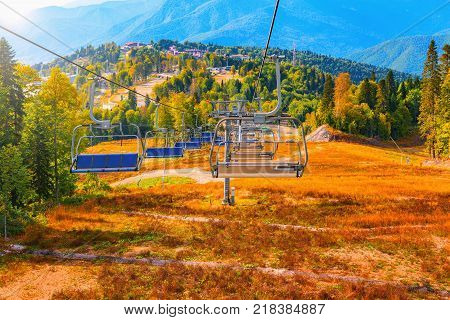 Cable car way in the mountain ski resort.