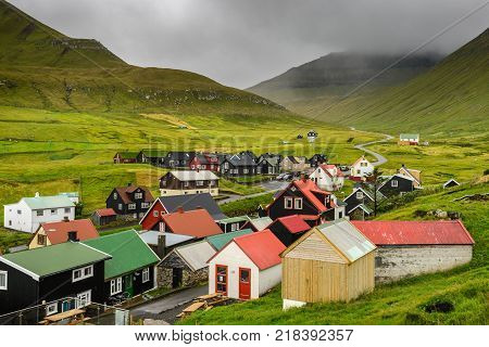 Picturesque village of Gjogv with typically colourful houses on the island of Eysturoy, Faroe Islands, Denmark