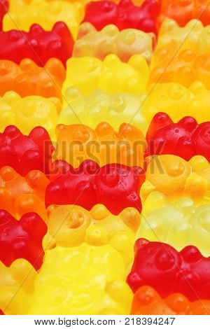 Gummy bear background. Gummy bears as texture. Gum bear candy colorful pattern. Gum bears.