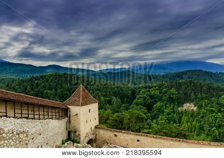 Mountain view of Rasnov medieval castle bastion	near Brasov, Romania