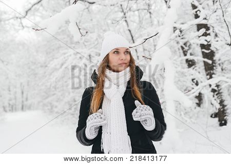 Beautiful Young Girl In A White Winter Forest