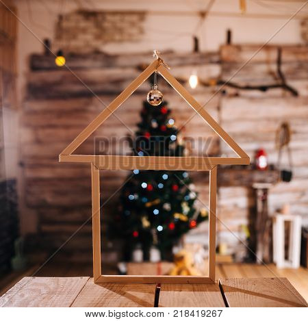 decorative wooden hut. New Year's decor. home interior.