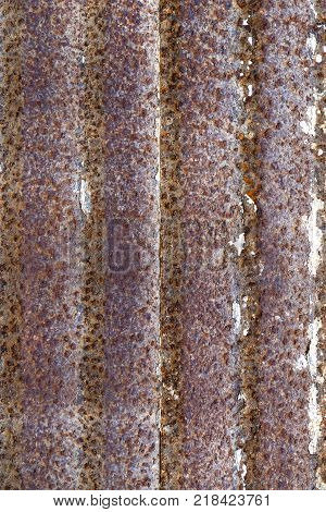 Background of rusty metal with irradiated paint