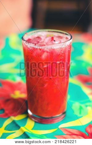 Red drink made of Strawberry ice and vodka known as Caipirinha de Morango in Brazil.