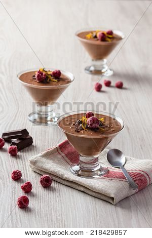 Fresh Chocolate Mousse And Raspberry In A Glasses.
