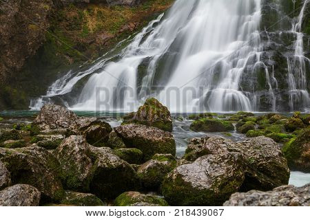 Beautiful Golling waterfall and near Golling and Salzach medieval town at autumn in Austria
