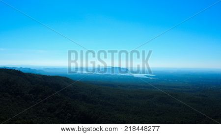 High angle view of multiple temples and pagodas on the Mt. Popa - holy mountain for burmese people with lots of temples on the top. Located in southeast of Bagan Myanmar (Burma).