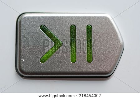 Play, pause switch close up macro shot.