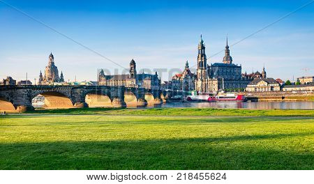 morning view of Cathedral of the Holy Trinity or Hofkirche Bruehl's Terrace or The Balcony of Europe. Colorful spring scene on Elbe river in Dresden Saxony Germany Europe.