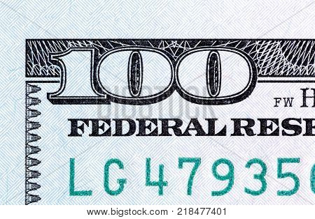 Number 100. Fragment of new 100 banknotes close-up. Hi resolution photo.