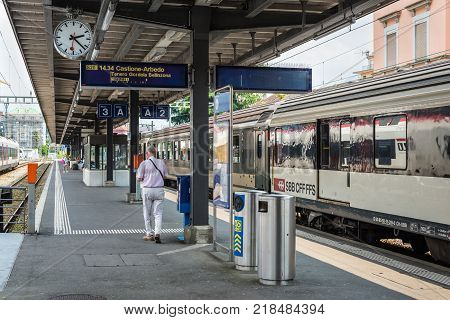 Locarno Switzerland - May 28 2016: A passenger train of the Swiss Federal Railways at a platform of the Locarno railway station. Swiss Federal Railways is the national railway company of Switzerland.