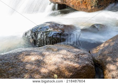 water in the mountain river . In the park in nature
