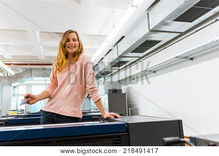 Young Female Engineer Printing Specialist Measuring Checking Colors Quality Booth Color Management I