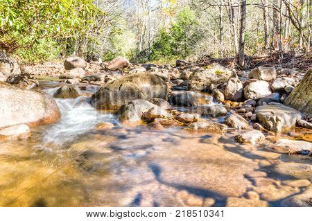 Williams River In Autumn With Stones, Bridge And Highland Scenic Highway Road In West Virginia Monon
