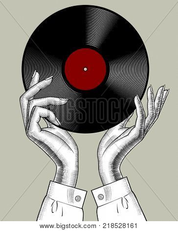 Woman's hands with a gramophone record. Retro music concept. Vintage stylized drawing