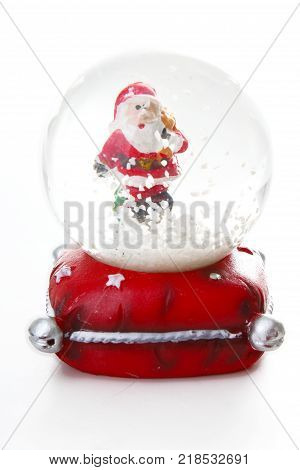 Waterglobe. Christmas waterglobe with Santa Claus. Christmas decoration glass ball water ball globe with snow and Santa Claus. Christmas decoration on white background.