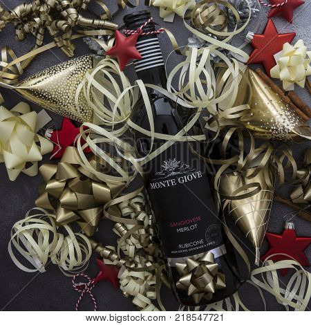 SWINDON UK - DECEMBER 3 2017: Bottle of Monte Giove Merlot red wine with Christmas decorations.