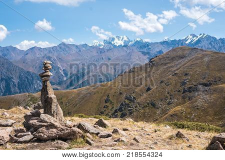 Panoramic view of the peak of Talgar from peak of Furmanov in Almaty region Kazakhstan .