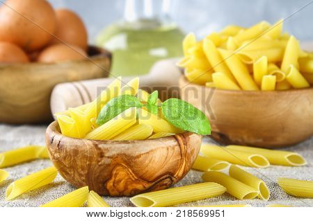 Penne rigate. Macaroni in the form of feathers. mostaccioli pasta