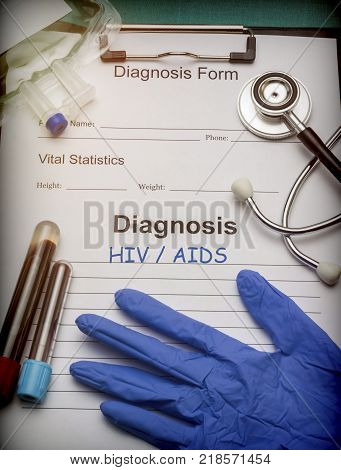 Diagnostic form, HIV / AIDS, Vial of blood samples and Medicine in a hospital, conceptual image
