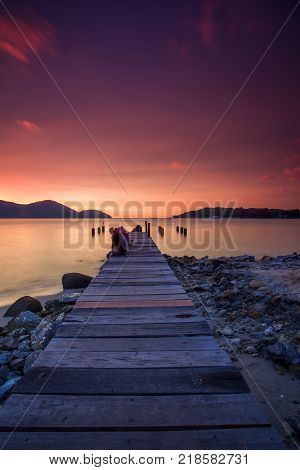 Beautiful view of sunset at Lumut,Perak,Malaysia. soft focus, blur due to long exposure. Visible noise due to high ISO.