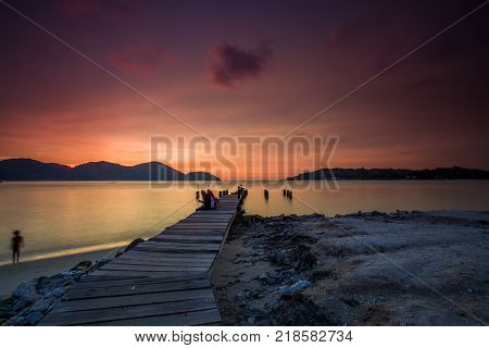 Beautiful view of sunset at Lumut,Perak,Malaysia. soft focus, blur due to long exposure. Visible noise due to high ISO.