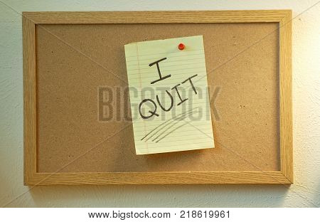 Bulletin Board with a Handwritten Note that says I Quit