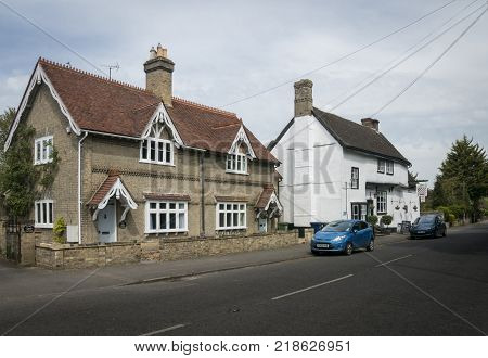 FOWLMERE, CAMBRIDGESHIRE, UK, MAY 2017 - View of the High Street and Chequers Public House Fowlmere Cambridgeshire UK