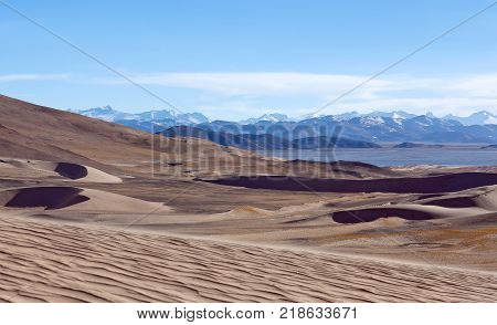 Sand Dunes And Himalayas Along China-nepal Border, Tibet